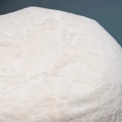 Sækkestol imiteret pels creme